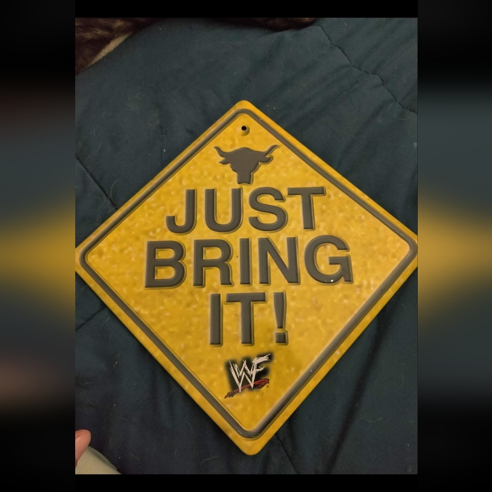 WWE Yellow Sign with Bull Logo